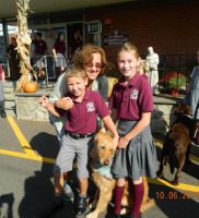 Alex (gr.3) and Caroline (gr.6) with their Grandmother and doggie