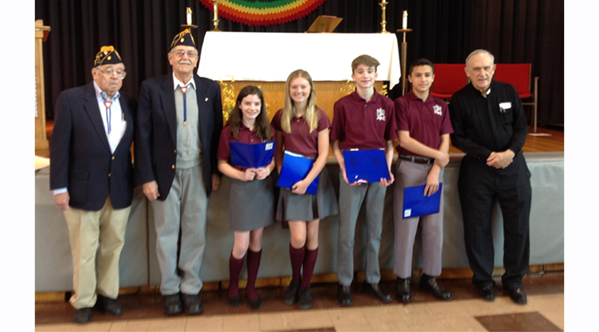 Vets Award Essay Winners at St. Isidore School