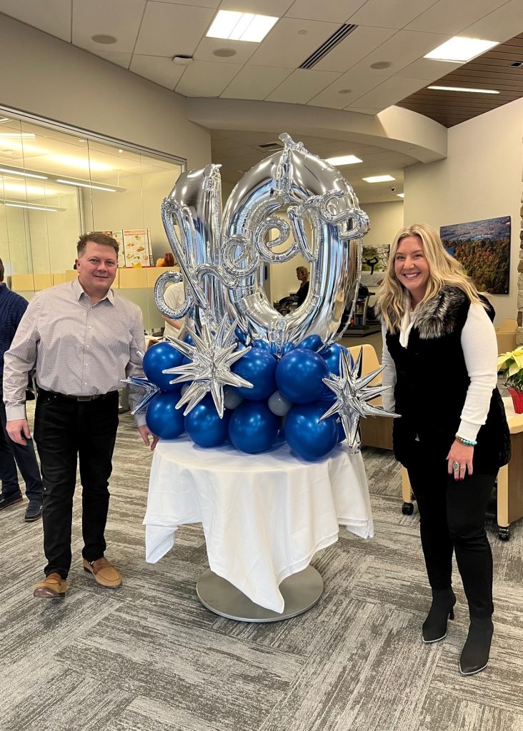Sean Madara, left, senior producer relations consultant at Capital Blue Cross, and Julie Young, large market account manager at Capital, join Wednesday’s celebration.