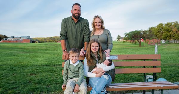 A group of people posing for a picture Description automatically generated