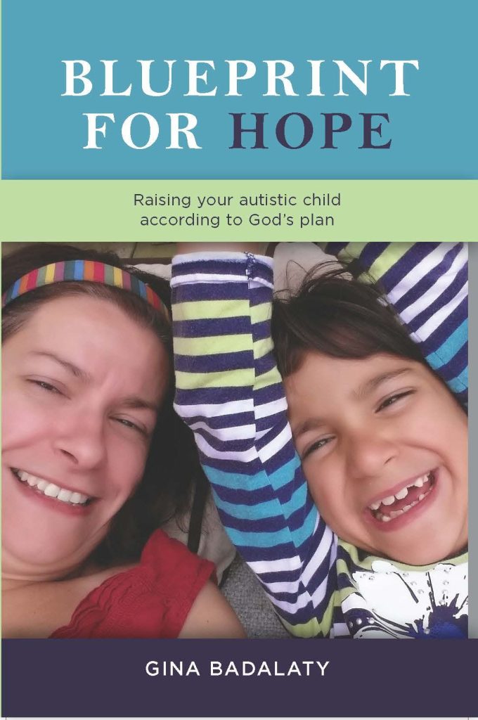 A person and child smiling for a picture Description automatically generated