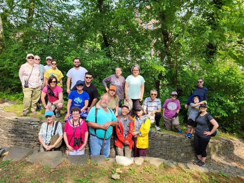 A group of people posing for a photo Description automatically generated